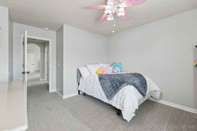 9401 N 95th E Pl, Owasso, OK 74055 - carpeted bedroom with baseboards and ceiling fan