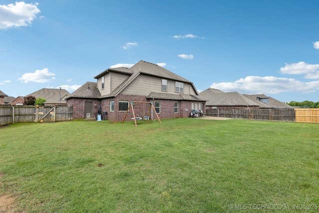 9401 N 95th E Pl, Owasso, OK 74055 - rear view of property with brick siding and a shingled roof