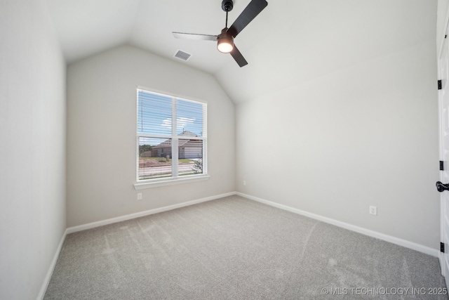 additional living space featuring carpet flooring, lofted ceiling, a ceiling fan, and baseboards