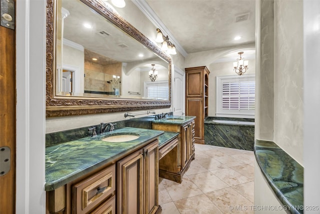 bathroom featuring a chandelier, vanity, crown molding, tiled shower, and tile patterned floors