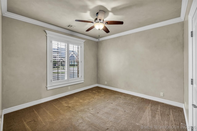 unfurnished room with ceiling fan, carpet, crown molding, and baseboards