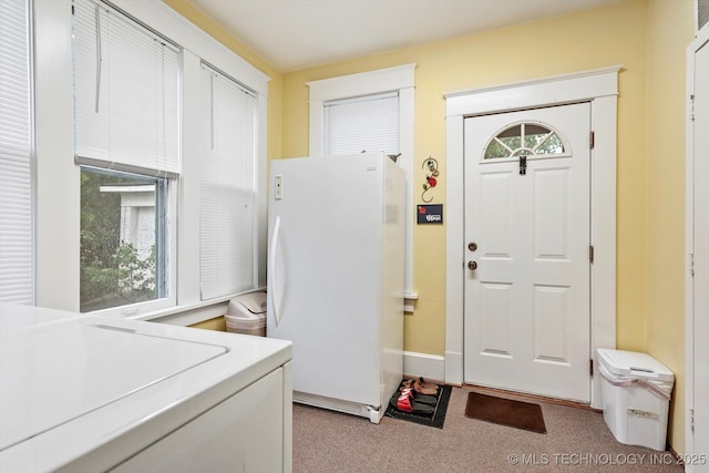 1032 E Mcleod Ave, Sapulpa, OK 74066 - laundry area with carpet floors and independent washer and dryer