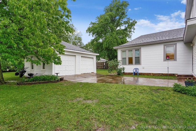 1032 E Mcleod Ave, Sapulpa, OK 74066 - view of green lawn with a detached garage and an outdoor structure