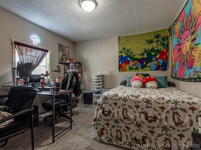 940 N Ross Ave, Dewey, OK 74029 - carpeted bedroom with a textured ceiling and a desk
