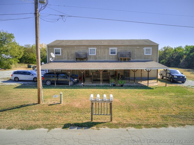 940 N Ross Ave, Dewey, OK 74029 - view of front facade featuring a front lawn