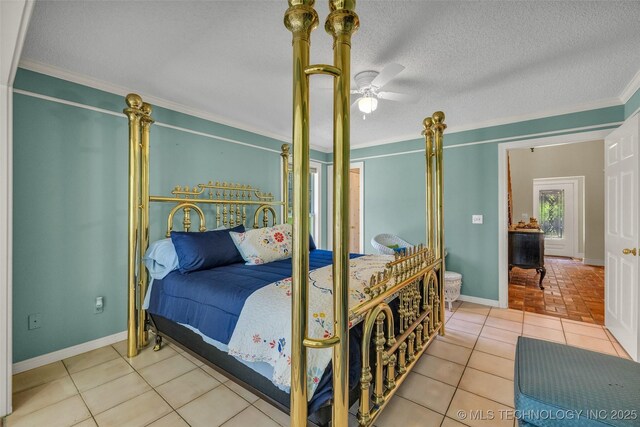 3112 Shore Dr, Grove, OK 74344 - tiled bedroom featuring ornamental molding, baseboards, and a ceiling fan