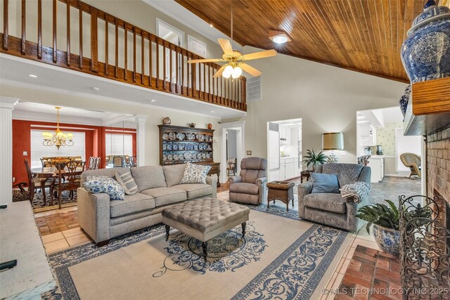 3112 Shore Dr, Grove, OK 74344 - living area featuring ornate columns, crown molding, high vaulted ceiling, wood ceiling, and a chandelier