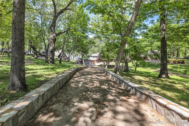 3112 Shore Dr, Grove, OK 74344 - view of home's community with a lawn