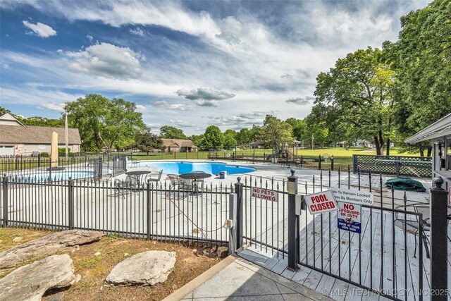 3112 Shore Dr, Grove, OK 74344 - community pool featuring fence and a gate