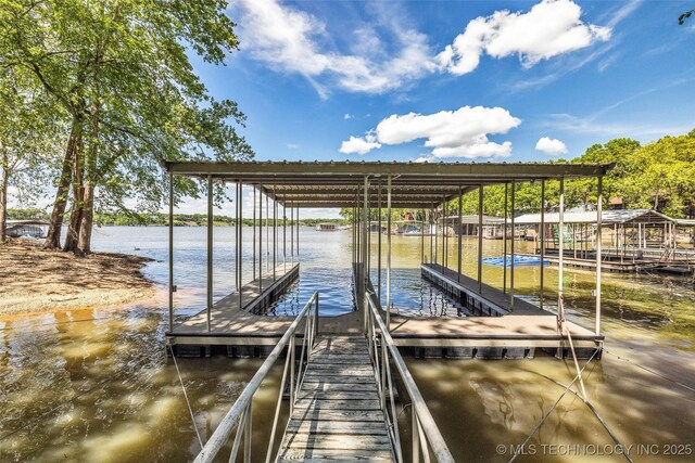 3112 Shore Dr, Grove, OK 74344 - dock area featuring a water view and boat lift