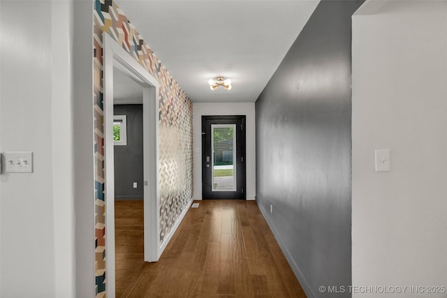 3130 E 47th St, Tulsa, OK 74105 - doorway to outside with wood finished floors, baseboards, and plenty of natural light