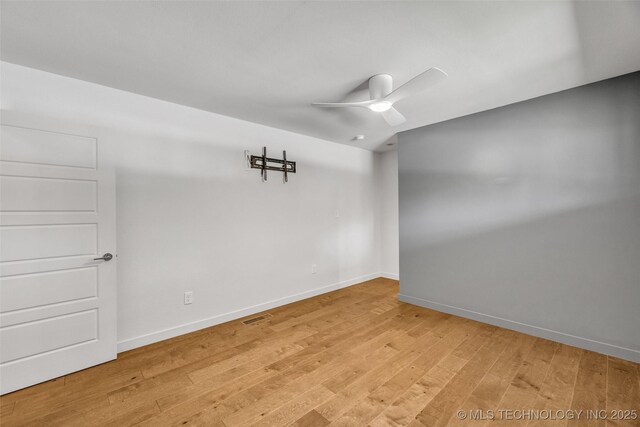 3130 E 47th St, Tulsa, OK 74105 - unfurnished room with light wood finished floors, ceiling fan, and baseboards