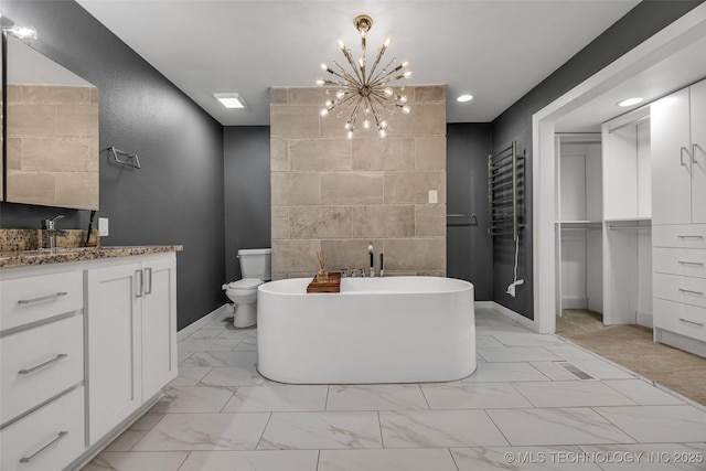 3130 E 47th St, Tulsa, OK 74105 - full bathroom featuring marble look tiles, a chandelier, vanity, a soaking tub, and recessed lighting