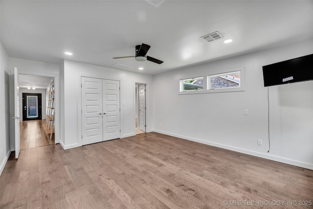 3130 E 47th St, Tulsa, OK 74105 - unfurnished bedroom featuring light wood-style flooring, baseboards, recessed lighting, a ceiling fan, and a closet