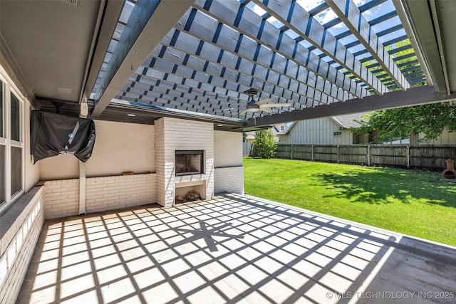 3130 E 47th St, Tulsa, OK 74105 - view of patio / terrace featuring a fireplace and a pergola