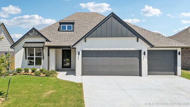 view of front of home featuring roof with shingles, a garage, concrete driveway, and a front lawn