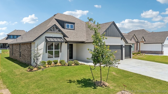 view of front facade featuring a garage, concrete driveway, a front lawn, and stucco siding