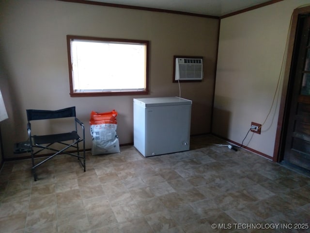 35530 W 261st St, Bristow, OK 74010 - laundry area featuring a wall mounted air conditioner, ornamental molding, and baseboards