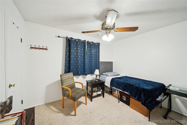 bedroom featuring carpet floors and ceiling fan