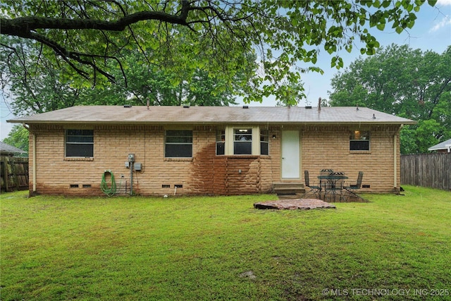 back of property with crawl space, entry steps, and a patio