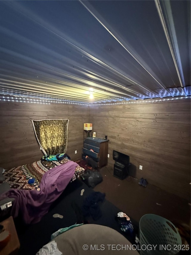 8326 N 496th Rd, Tahlequah, OK 74464 - bedroom featuring wood walls and carpet floors