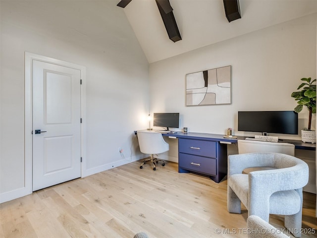 home office featuring light wood-type flooring, baseboards, high vaulted ceiling, and a ceiling fan
