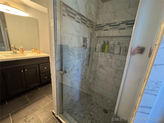 4302 E 67th St Unit 656, Tulsa, OK 74136 - full bathroom with a shower stall, vanity, and tile patterned floors