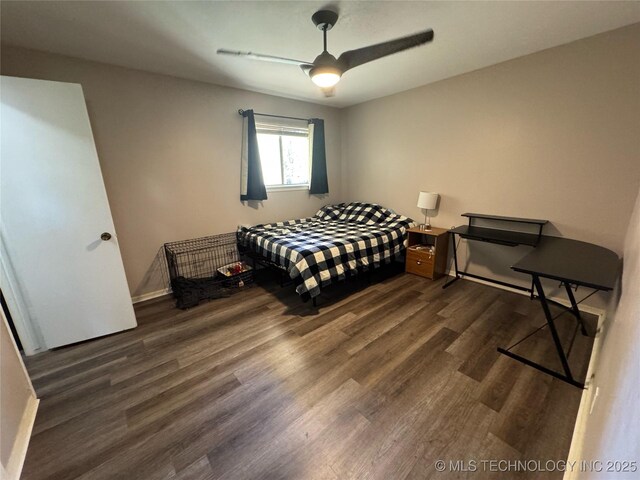 4302 E 67th St Unit 656, Tulsa, OK 74136 - bedroom with wood finished floors, baseboards, and a ceiling fan