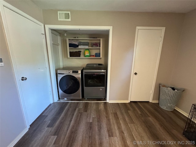 4302 E 67th St Unit 656, Tulsa, OK 74136 - clothes washing area with independent washer and dryer, dark wood-style flooring, and baseboards