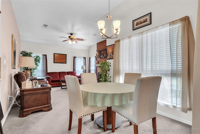 813 Franklin, Ardmore, OK 73401 - carpeted dining room featuring a ceiling fan, a chandelier, and baseboards
