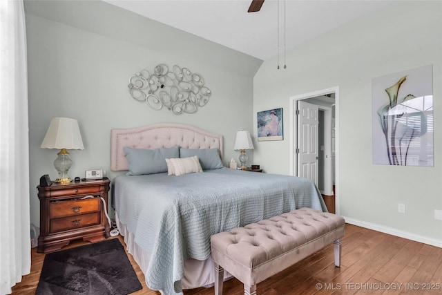 813 Franklin, Ardmore, OK 73401 - bedroom featuring lofted ceiling, wood finished floors, baseboards, and ceiling fan