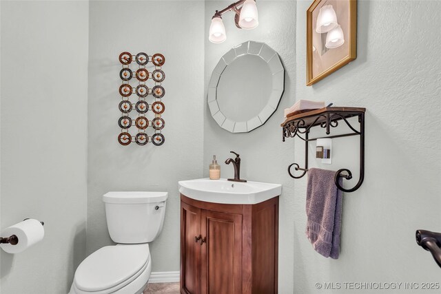 813 Franklin, Ardmore, OK 73401 - bathroom with toilet and vanity
