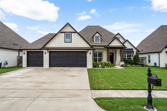 view of front of house with board and batten siding, a front yard, driveway, a garage, and brick siding