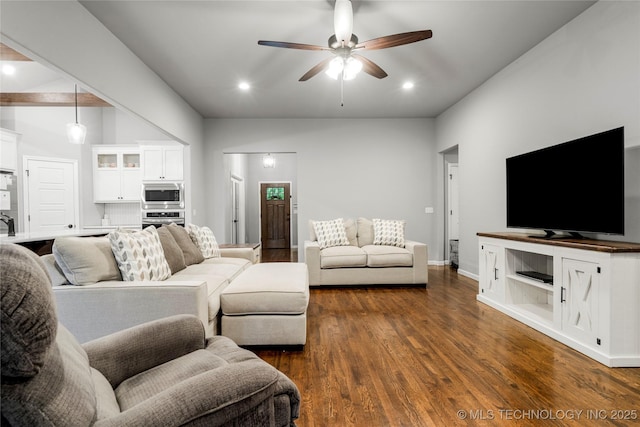 living room with ceiling fan, dark wood finished floors, recessed lighting, and baseboards