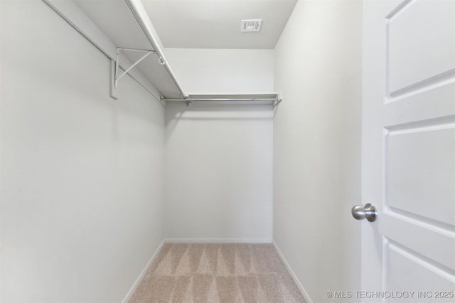 7535 E 158th St S, Bixby, OK 74008 - spacious closet featuring light colored carpet