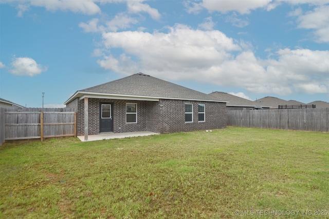 7535 E 158th St S, Bixby, OK 74008 - rear view of property with a patio area, brick siding, and a shingled roof
