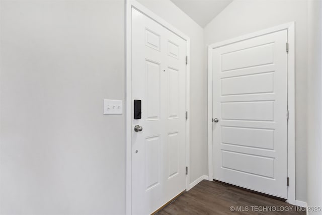 7535 E 158th St S, Bixby, OK 74008 - entryway featuring dark wood-style floors and baseboards