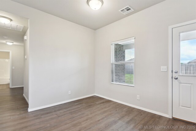 7535 E 158th St S, Bixby, OK 74008 - unfurnished room featuring wood finished floors and baseboards