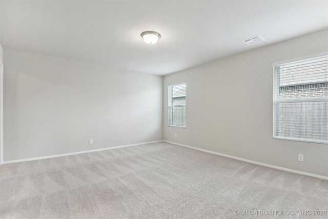 7535 E 158th St S, Bixby, OK 74008 - unfurnished room featuring light colored carpet and baseboards