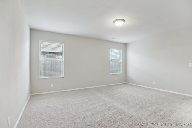 7535 E 158th St S, Bixby, OK 74008 - unfurnished room featuring carpet flooring and baseboards