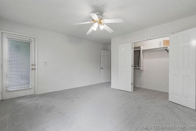 unfurnished bedroom with light carpet and a ceiling fan