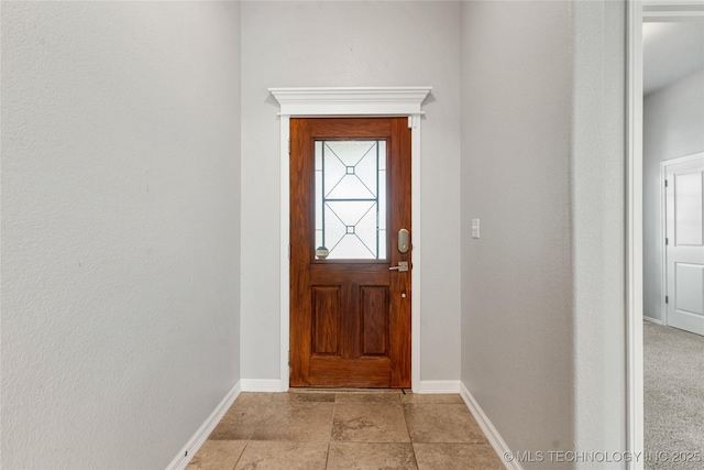 doorway with baseboards