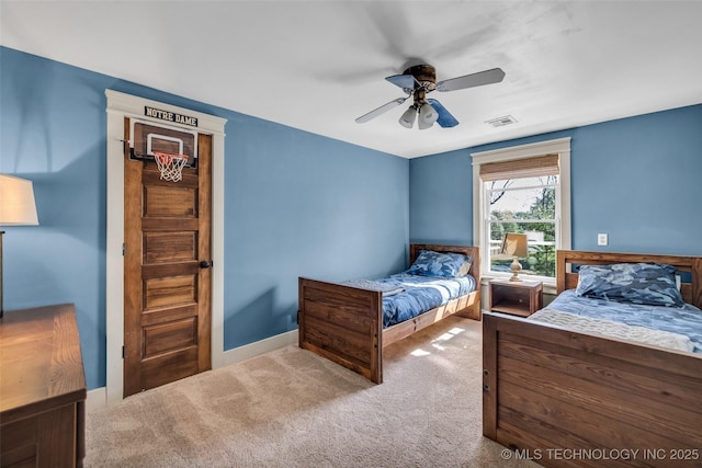 bedroom with carpet, ceiling fan, and baseboards