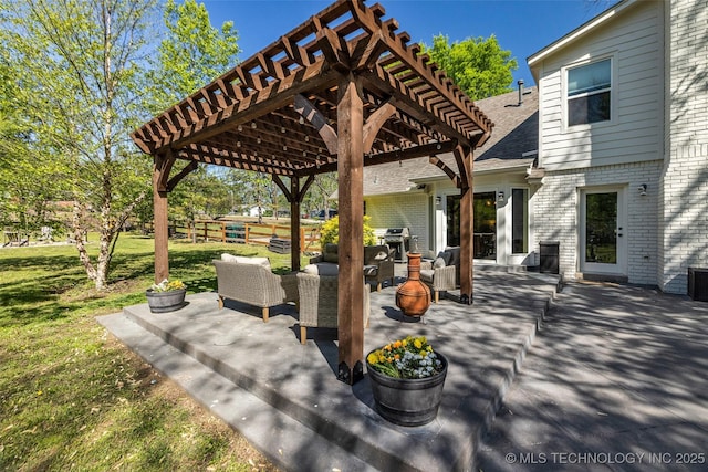 view of patio / terrace with a pergola and area for grilling