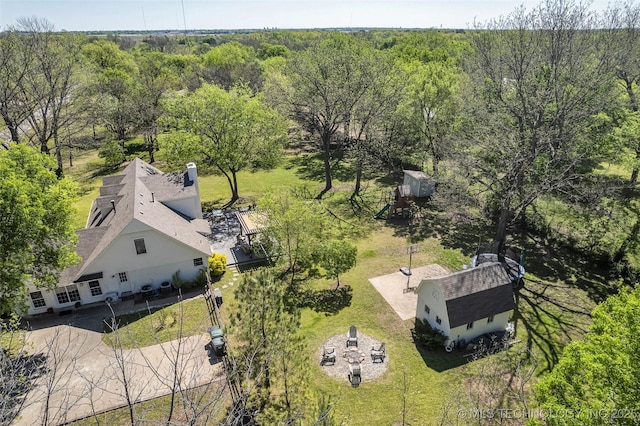 view from above of property featuring a forest