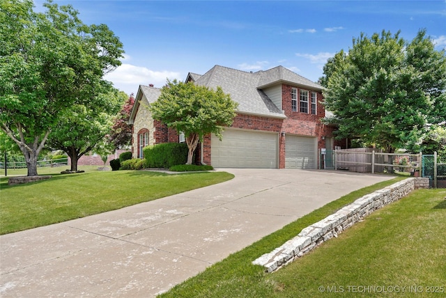 traditional home featuring brick siding, concrete driveway, a shingled roof, and a garage