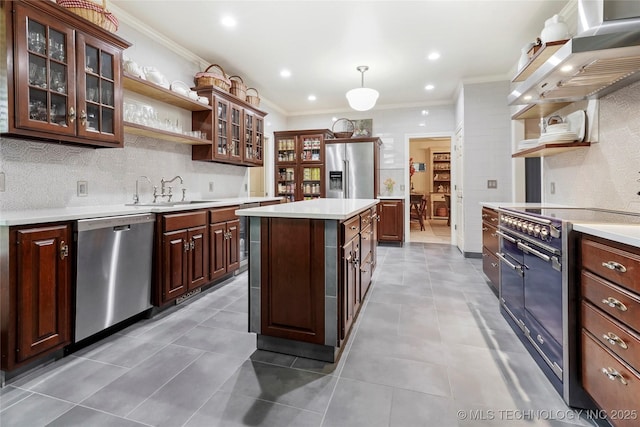 kitchen featuring open shelves, high quality appliances, a sink, crown molding, and exhaust hood