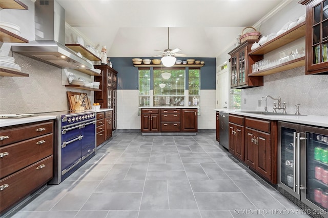 kitchen featuring open shelves, stainless steel appliances, island range hood, wine cooler, and a sink