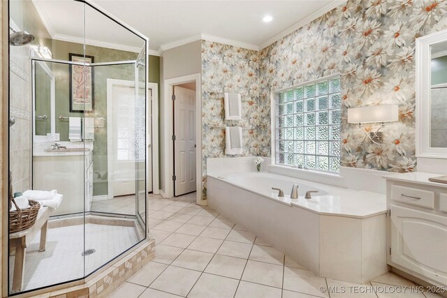 bathroom with crown molding, vanity, a stall shower, a bath, and tile patterned flooring