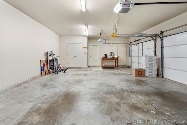 garage featuring a garage door opener
